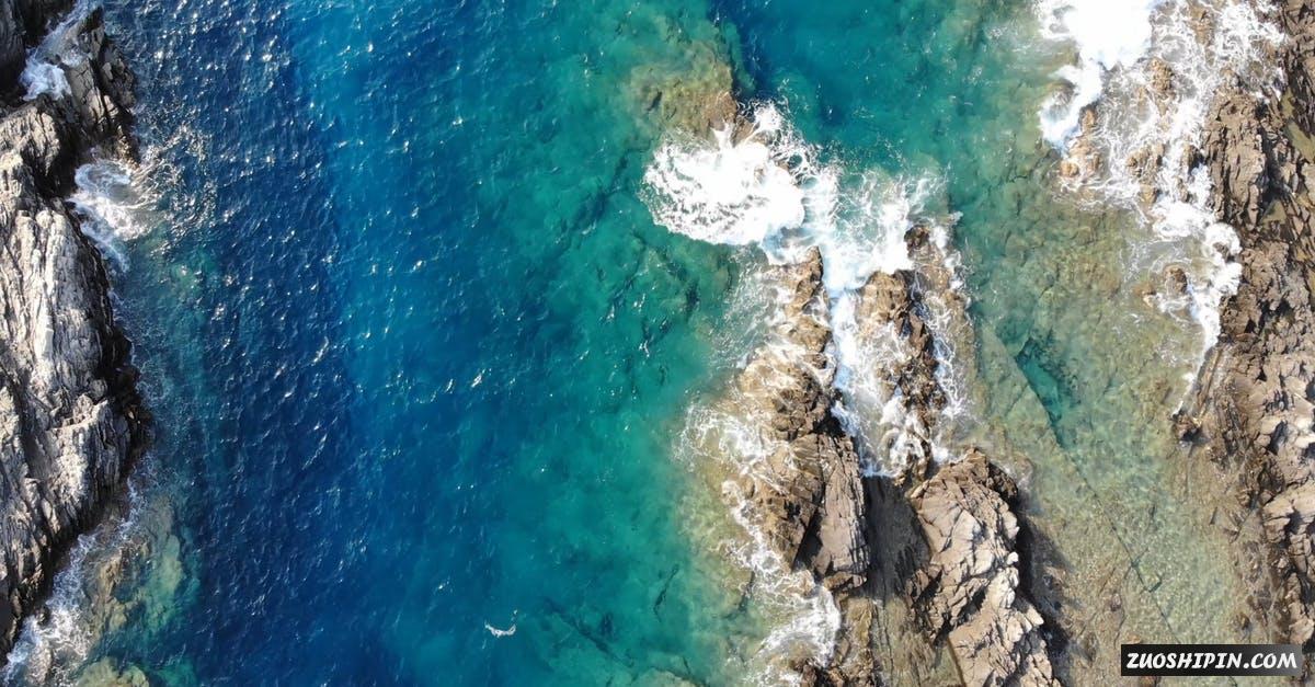 1416529|俯拍海水变色海中礁石视频素材插图